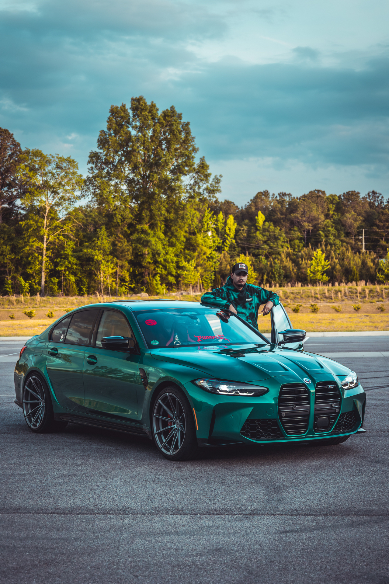 Stzy, founder of StzyShots, with his BMW M3